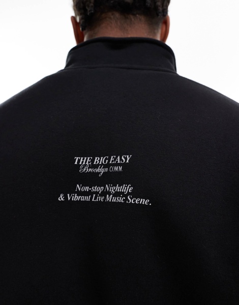 Bershka 1/4 zip printed sweatshirt in black
