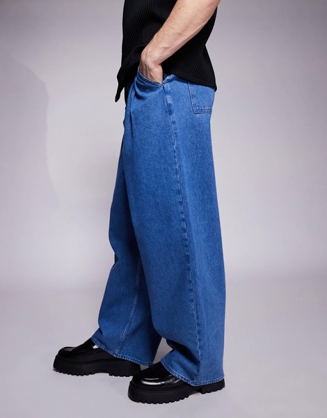 ASOS DESIGN oversized baggy jeans with side belts in mid wash blue