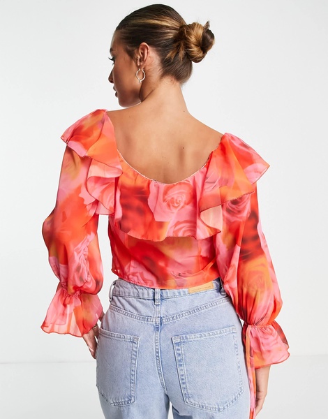 ASOS DESIGN ruffle front blouse with tie in blurred rose print