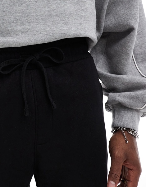 Bershka jersey shorts in black