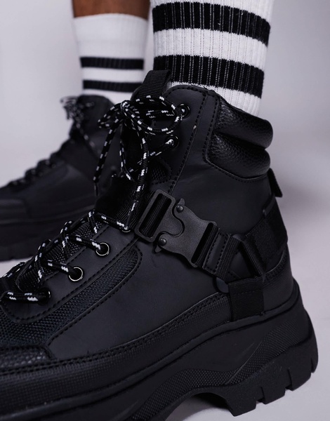 ASOS DESIGN lace up worker boots in black with chunky sole and straps