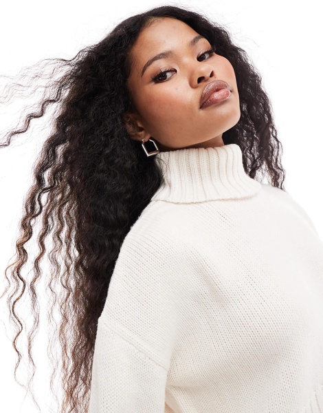 ASOS DESIGN Petite cropped roll neck sweater in cream