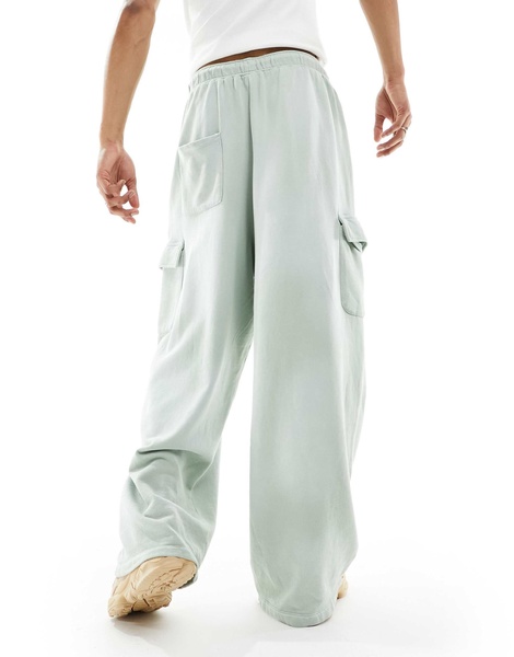 ASOS DESIGN unisex wide leg sweatpants with cargo pockets in washed green - part of a set