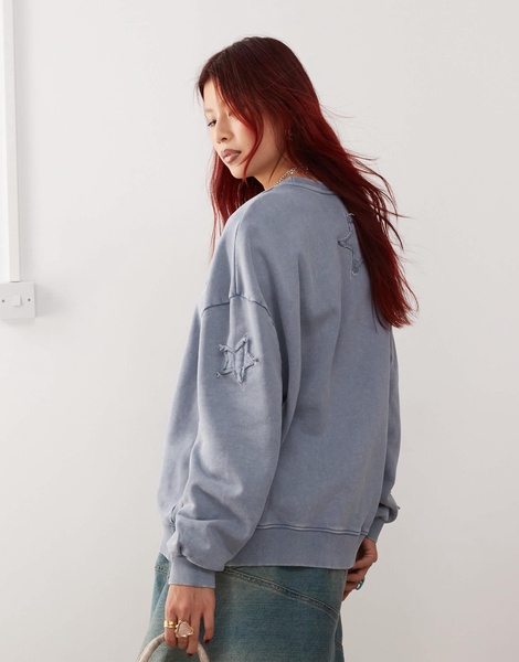 Monki oversized sweatshirt with applique stars in washed blue