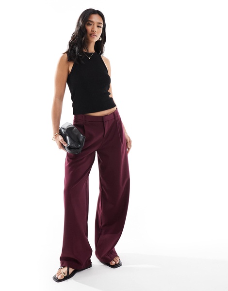 Bershka Petite low rise wide leg tailored pants in burgundy