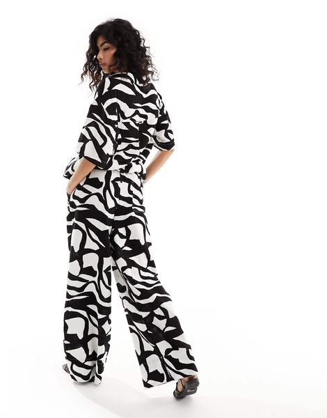 ASOS DESIGN cheesecloth tie waist wide pull on pants in print
