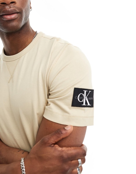 Calvin Klein Jeans badge logo t-shirt in beige