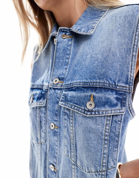Bershka oversized longline denim vest in indigo wash