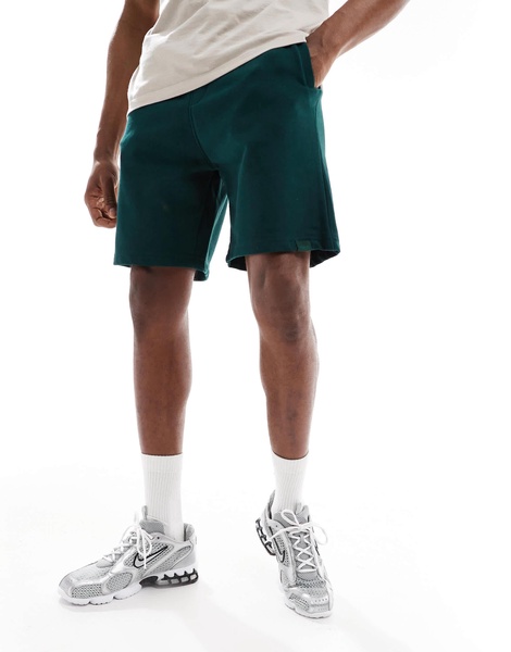 Bershka jersey shorts in dark green