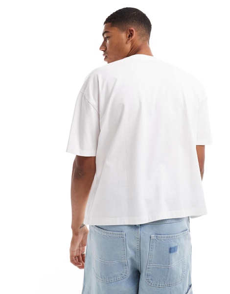ASOS DESIGN oversized t-shirt in white with cherub chest print