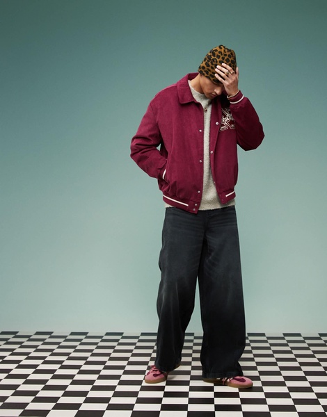 ASOS DESIGN oversized corduroy varsity jacket in burgundy