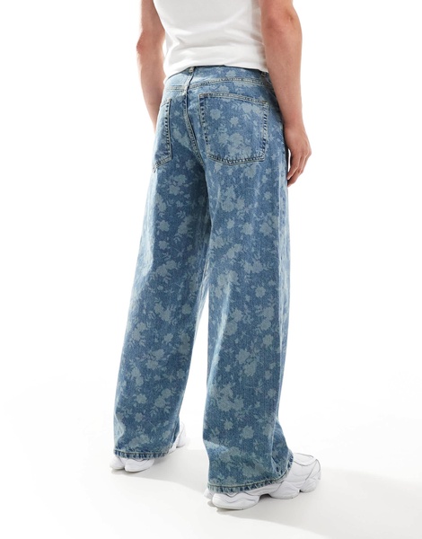 ASOS DESIGN super baggy jeans with floral design in washed blue