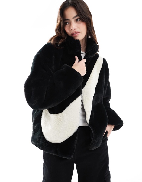 Nike faux fur Swoosh jacket in black