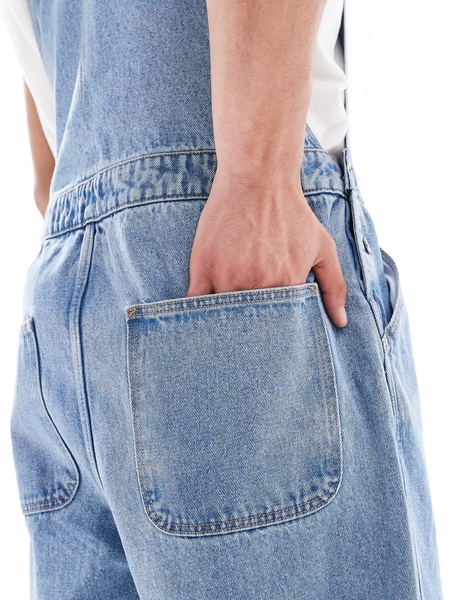 ASOS DESIGN oversized denim overalls in mid wash blue