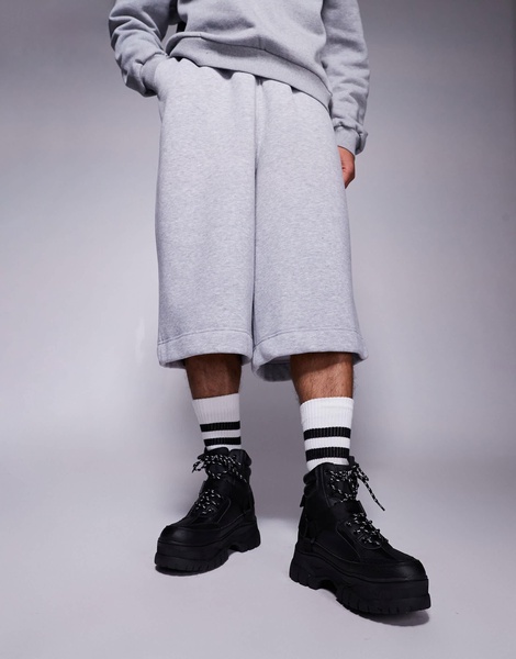 ASOS DESIGN lace up worker boots in black with chunky sole and straps