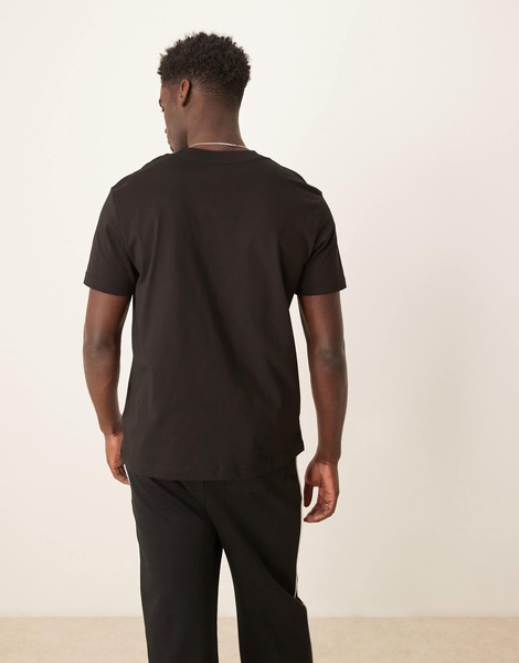Calvin Klein Jeans large logo t-shirt in black and red