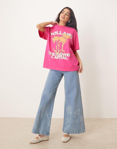 ASOS DESIGN oversized T-shirt with Holland floral graphic in pink