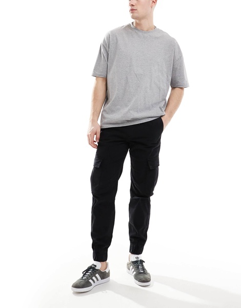 Bershka cuffed cargo pants in black