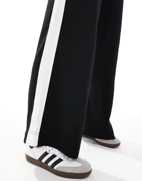 ASOS DESIGN Petite pull-on pants with contrast panel in black