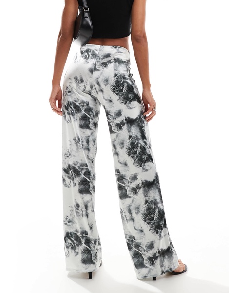ASOS DESIGN wide leg satin twill pants in distorted animal print