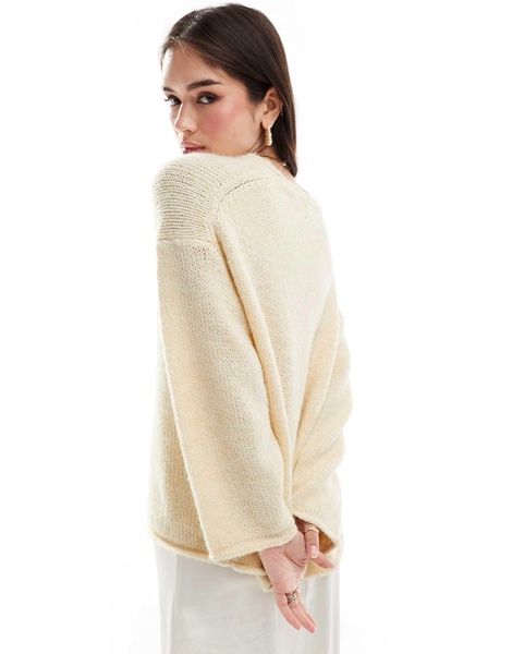 ASOS DESIGN loose knit v neck longline sweater in cream