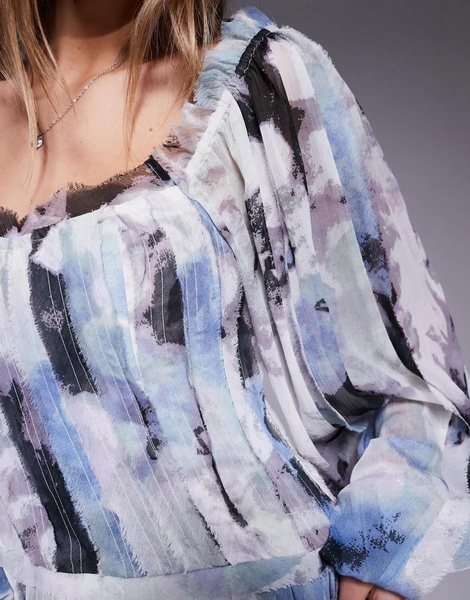 ASOS DESIGN raw edge paneled mini dress with blouson sleeves in abstract print