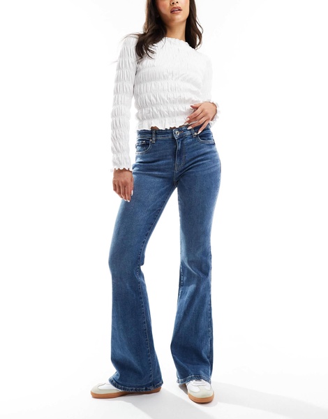 Bershka high waisted flared jeans in mid wash blue