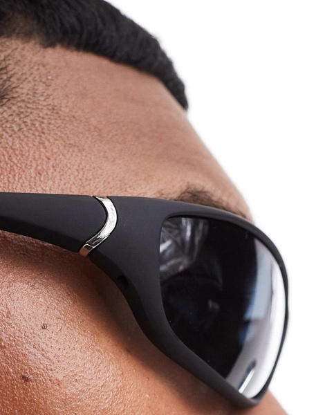 ASOS DESIGN curved frame sunglasses with smoke lens in matte black