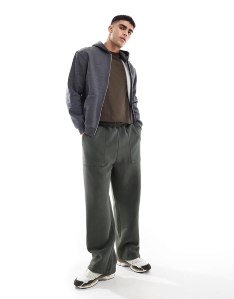 ASOS DESIGN wide leg sweatpants with pocket details in washed green