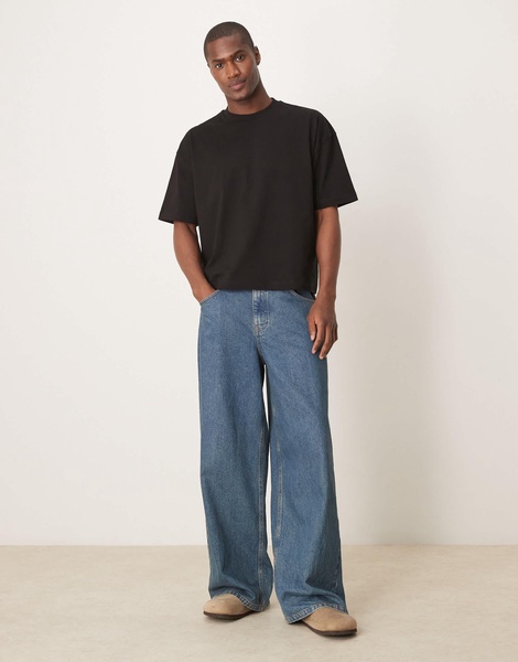 ASOS DESIGN boxy oversized T-shirt with back sports graphic in black