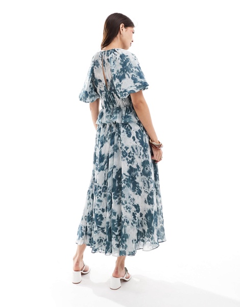 ASOS DESIGN puff sleeve midi dress with gauged waist in blue floral print