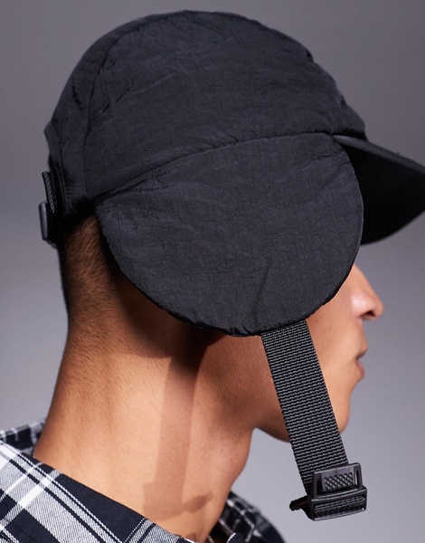 ASOS DESIGN nylon puffer trapper cap in black