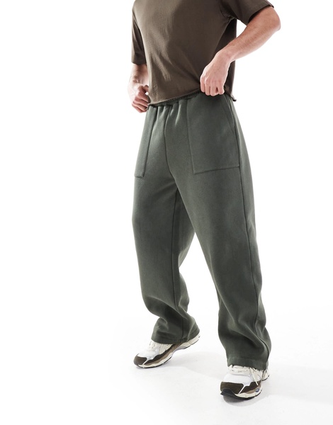 ASOS DESIGN wide leg sweatpants with pocket details in washed green