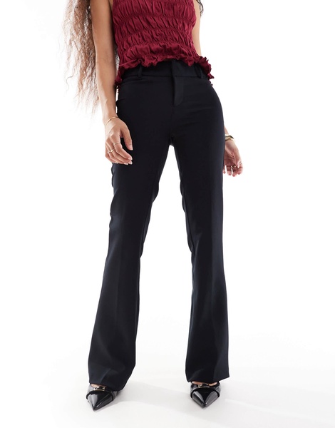 Bershka Petite flared tailored pants in black