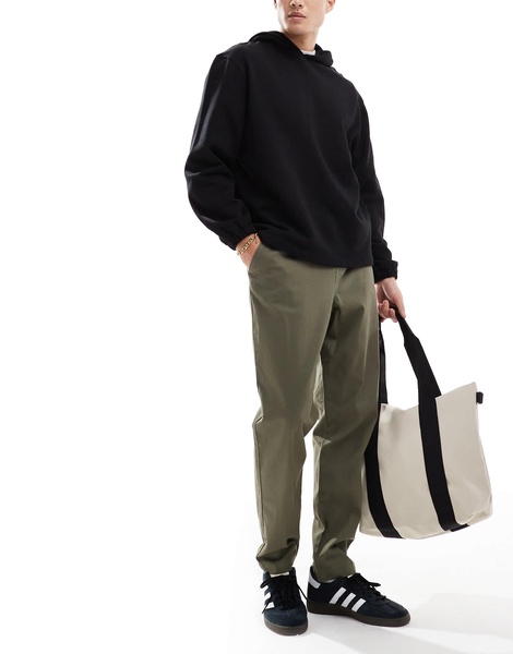 ASOS DESIGN tapered pull on chino with elastic waist in khaki