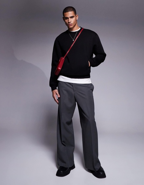 ASOS DESIGN oversized boxy sweatshirt with pockets in black