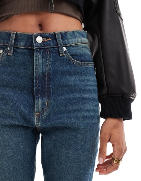 ASOS DESIGN Tall mid rise flare jeans in dark tinted blue