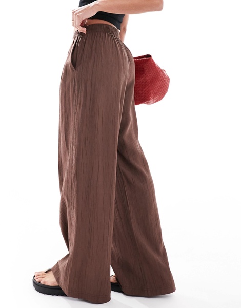 Bershka crinkle wide leg pants in brown
