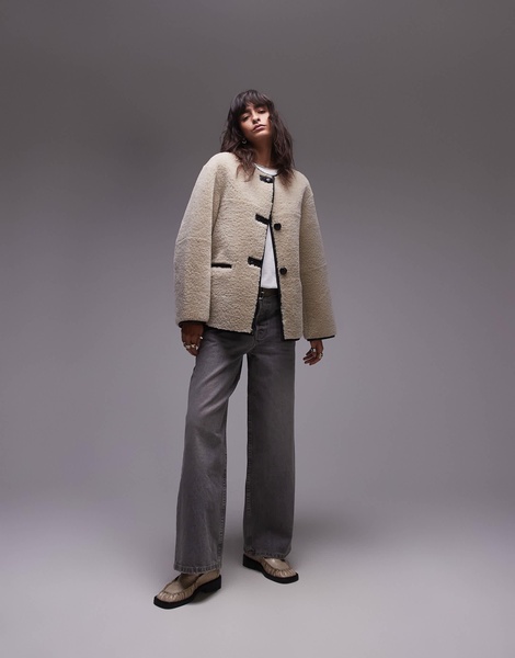 Mango contrast detail collarless faux shearling jacket in ecru