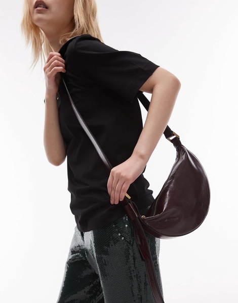 AllSaints half moon leather crossbody bag in burgundy