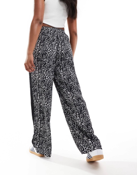 ASOS DESIGN pull-on pants with contrast panel in mono animal print
