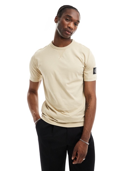 Calvin Klein Jeans badge logo t-shirt in beige