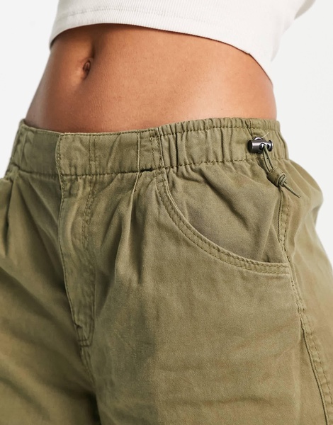 Bershka baggy parachute tech pants in khaki