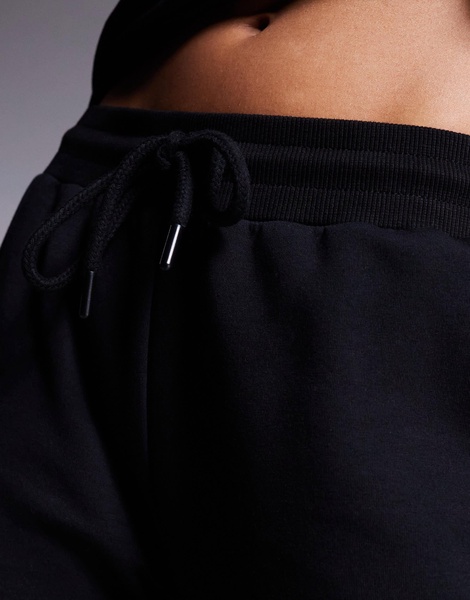 ASOS DESIGN interlock flared sweatpants in black - part of a set