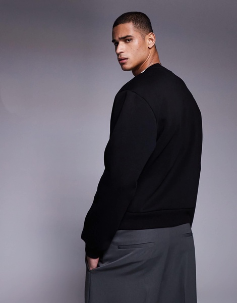 ASOS DESIGN oversized boxy sweatshirt with pockets in black