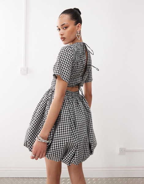 Amy Lynn shirred peplum mini dress with tie back in mono gingham