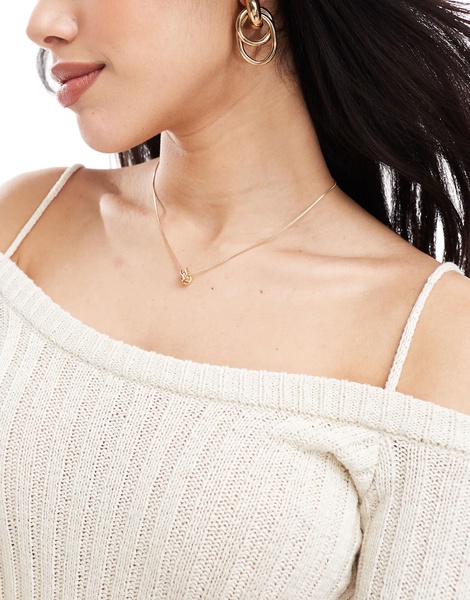 Bershka rib knit hankerchief hem top in ecru