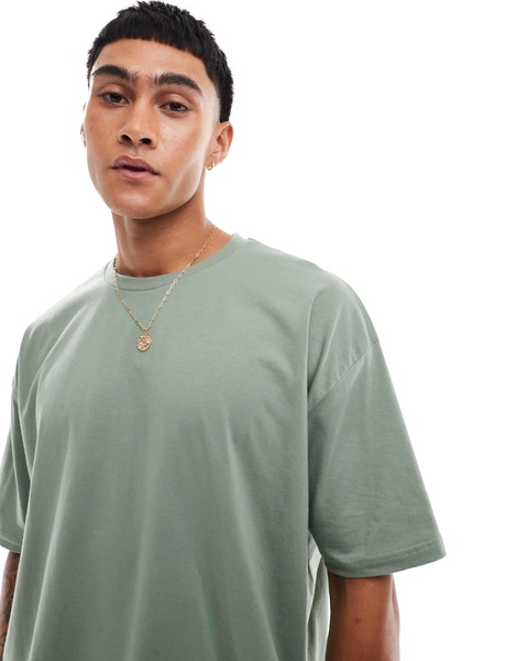 ASOS DESIGN oversized t-shirt with cartoon back print in green