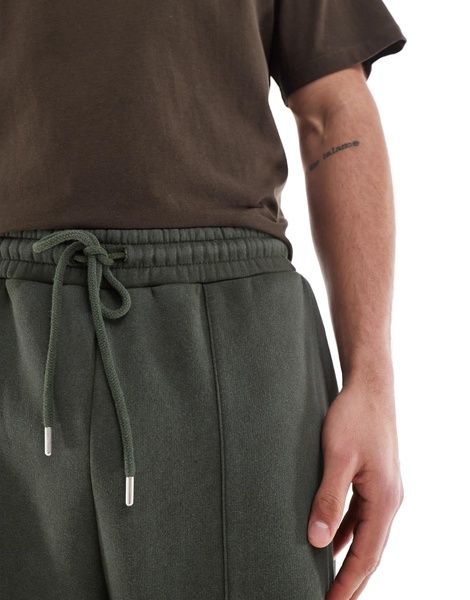 ASOS DESIGN wide leg sweatpants with pocket details in washed green