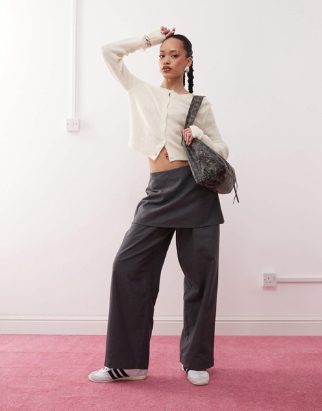 Reclaimed Vintage mini skirt over pants in gray